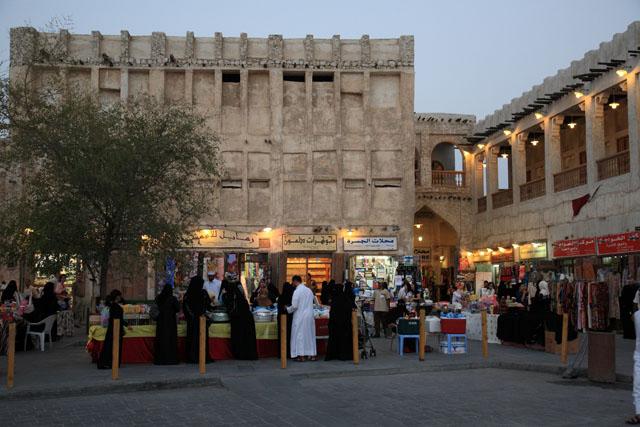 Street food market and entrance to the cloth market, at early evening