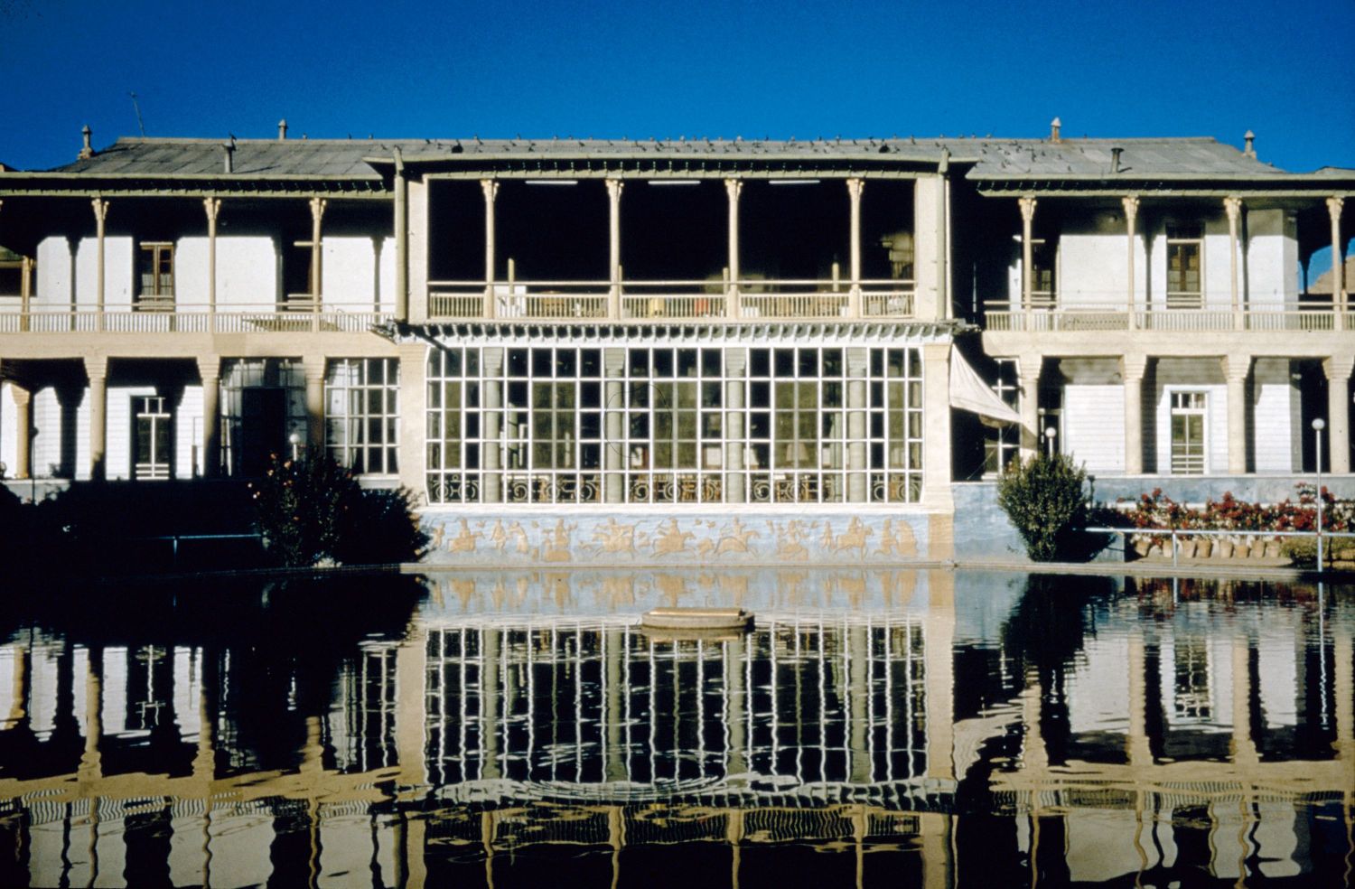 Exterior view of façade and reflection pool.