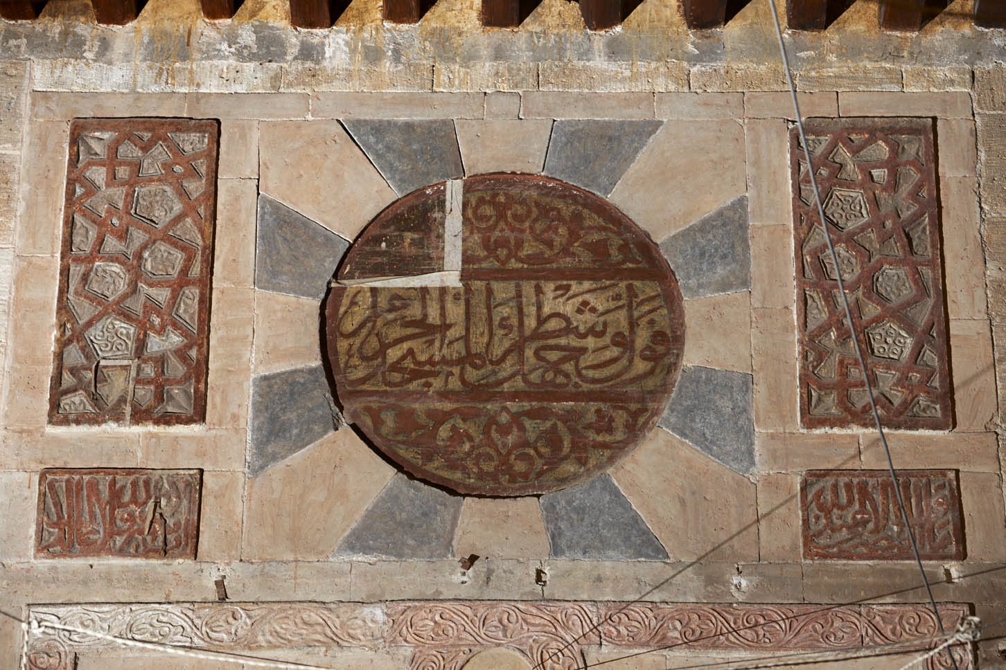Detail of inscription and ornament above mihrab