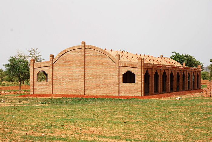 The architecture of the school has a close connection with the local building and housing traditions    
