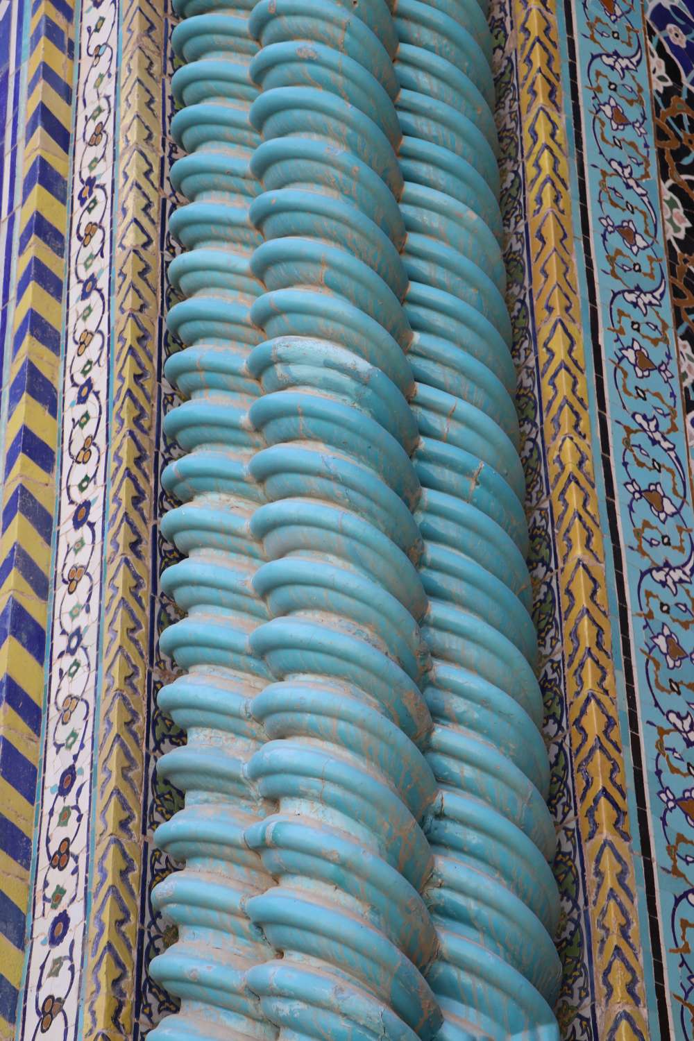 Tilework and ceramic molding on entrance portal.