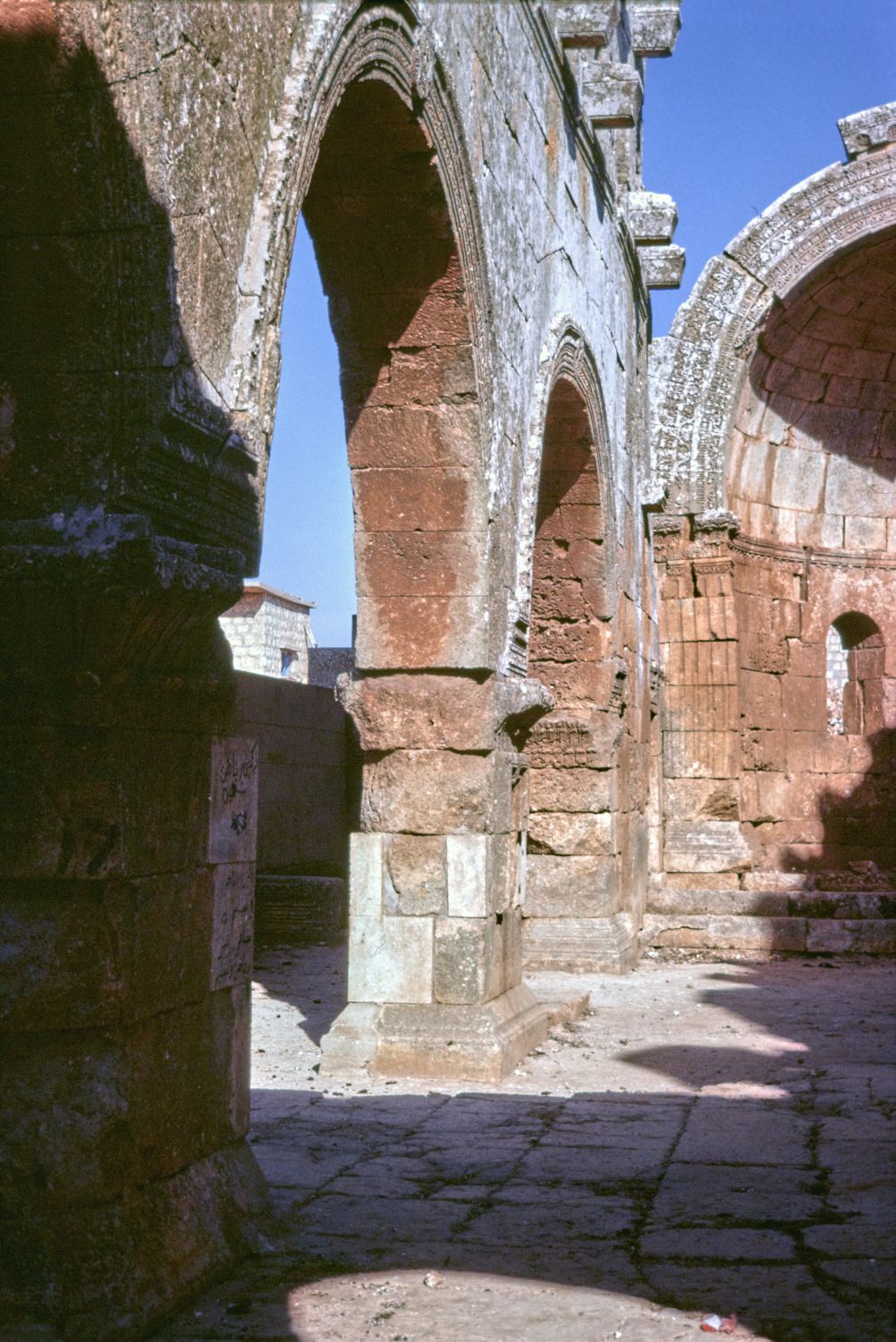 View along north side of nave facing east toward apse.