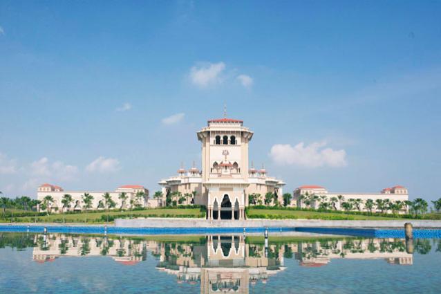 Dewan Negeri Johor (State legislative assembly building) reflected on the pool at Dataran Mahkota