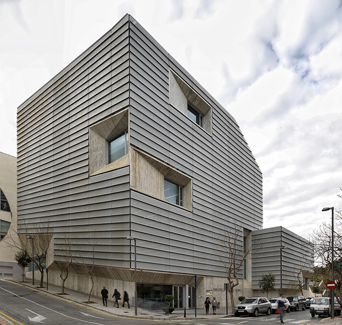 The perforated aluminium panels are used to unify the different elements of the building facades

