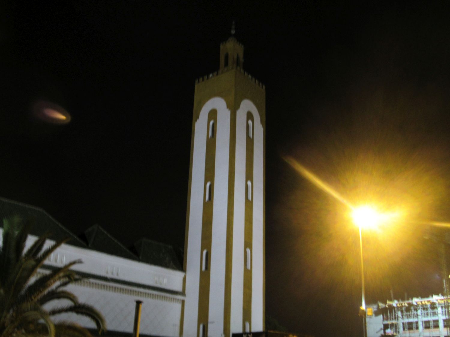 Exterior view, mosque minaret at night