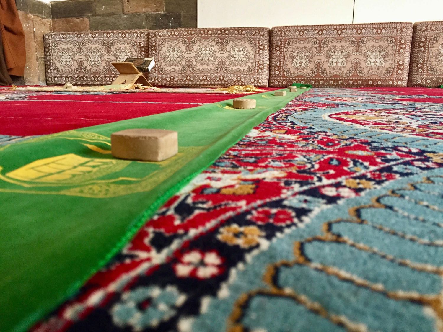 Detail view of the carpets on the floor of the main Prayer Hall.