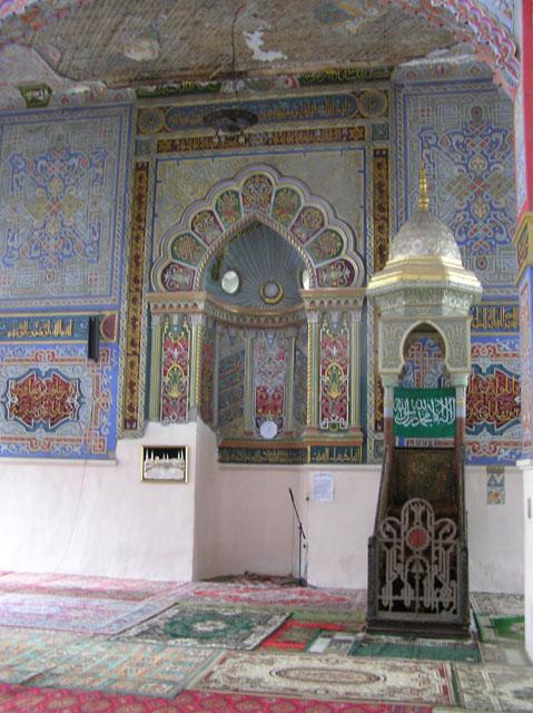 Interior view of the decorated mihrab and minbar