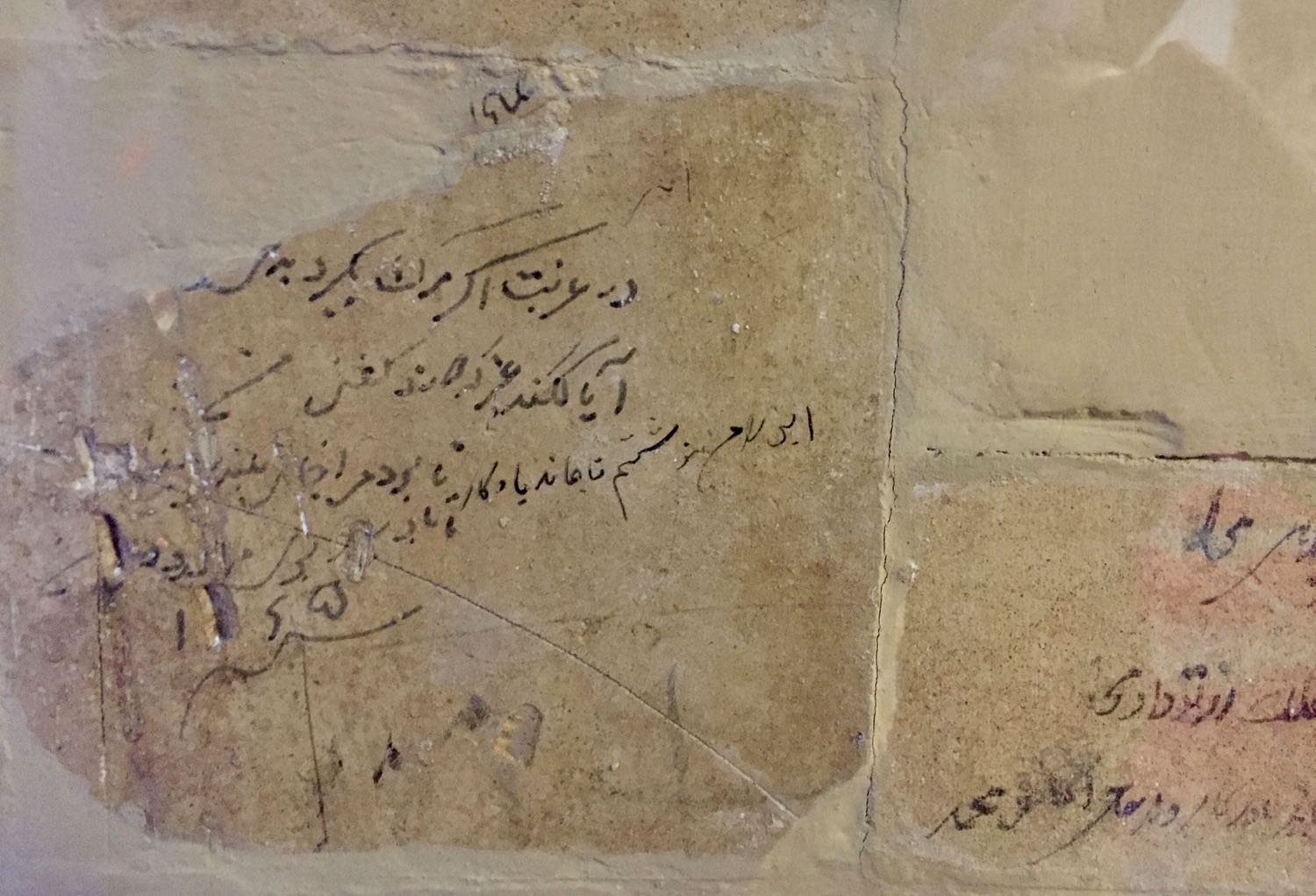 Inscription on the wall. Detail from the interior.