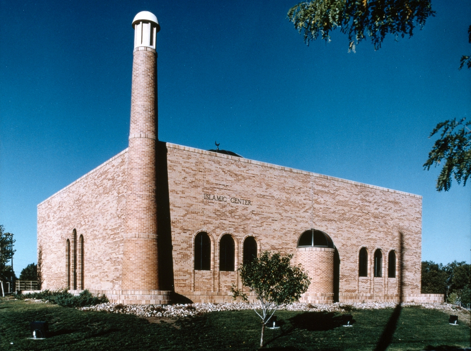 Exterior view, northeastern facade, with minaret and mihrab