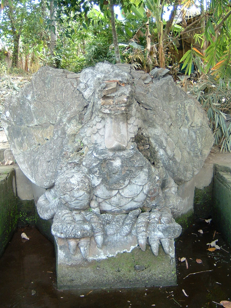 Detail view looking east showing the western sculpture representing mythical bird (garuda)