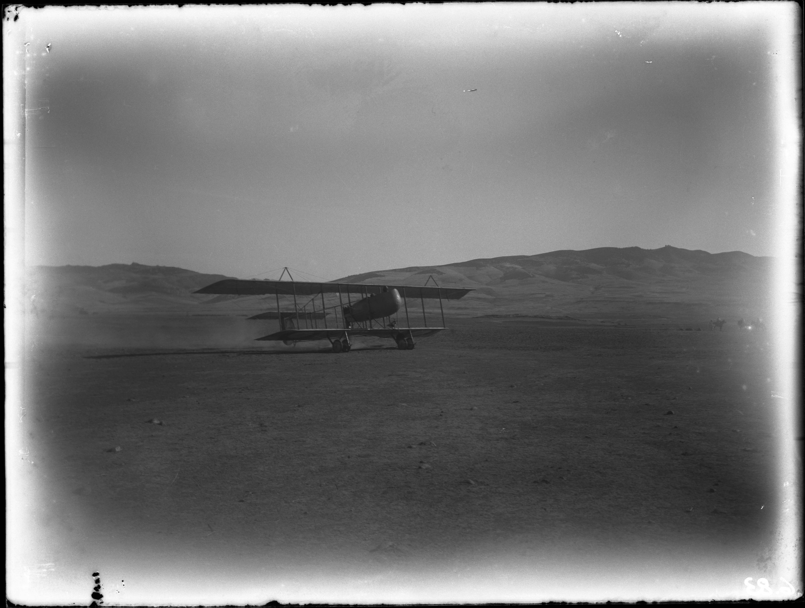 Aeroport Ibn Battouta de Tanger - <p>View of a biplane taxiing, mountains in the background.</p>