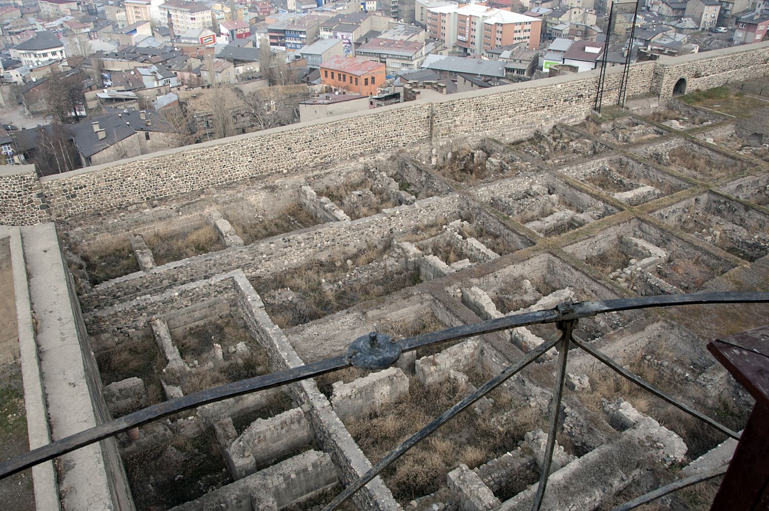 View of foundations of excavated buildings in citadel.