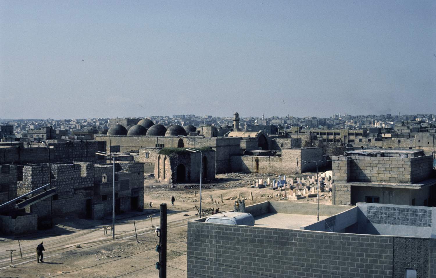 Madrasa al-Firdaws - Distant view from northeast, showing cemetery in foreground.