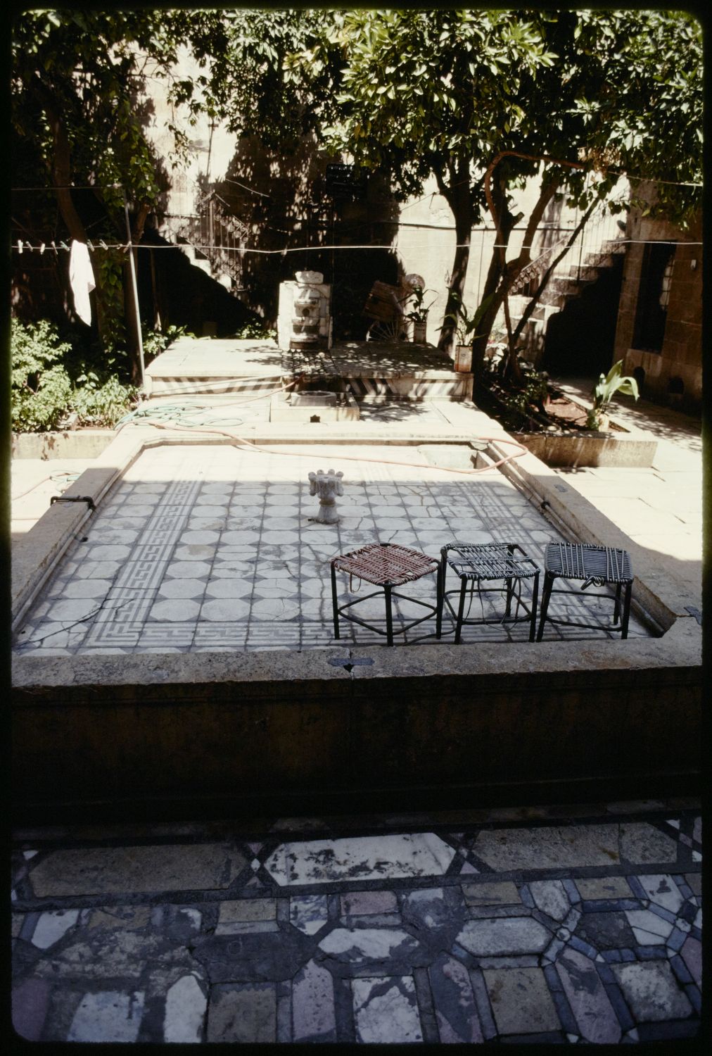 Bayt Kibba - Courtyard, view of fountain and pavement.