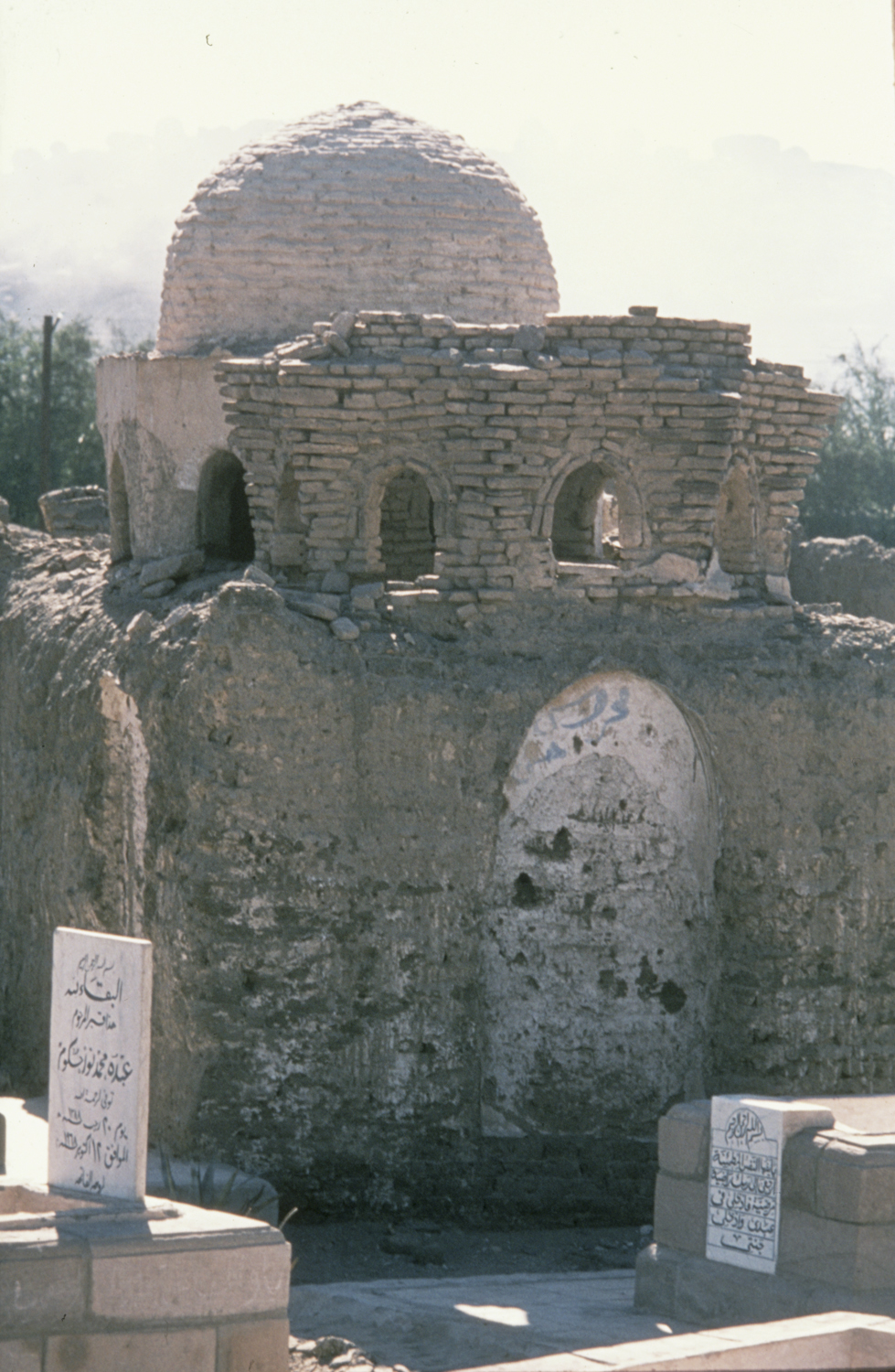 A mausoleum with a fallen dome