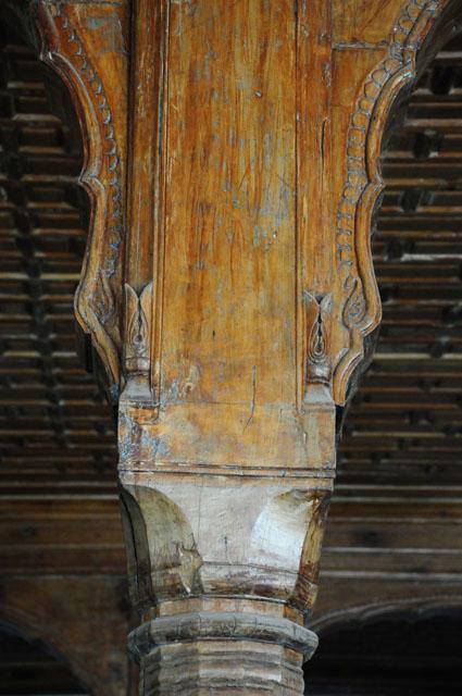 Close up, top of the wooden column