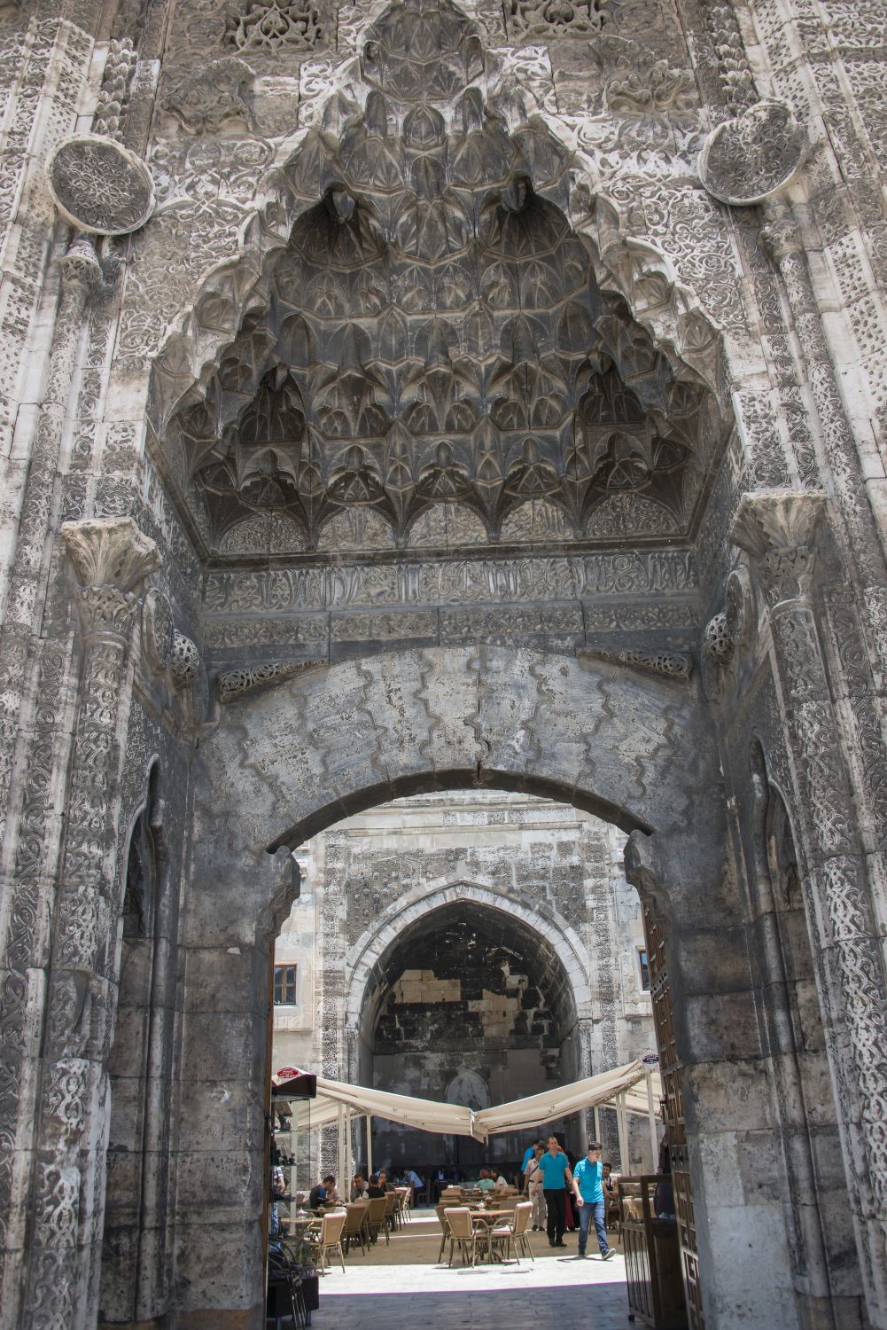 Entrance portal: view of muqarnas hood and through gate into interior.