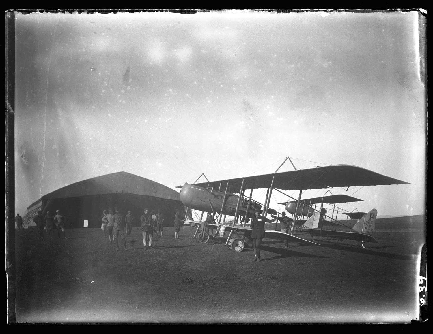 Aeroport Ibn Battouta de Tanger - A group of engineers and laborers posed by an airplane at the Tangier airport
