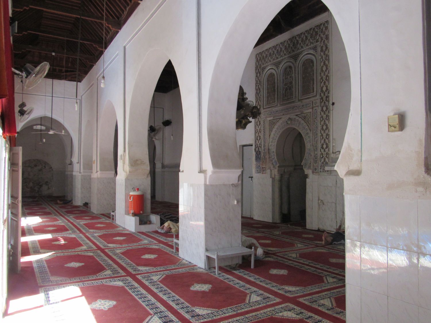 Interior view of the prayer hall, mihrab and qibla wal on the right.