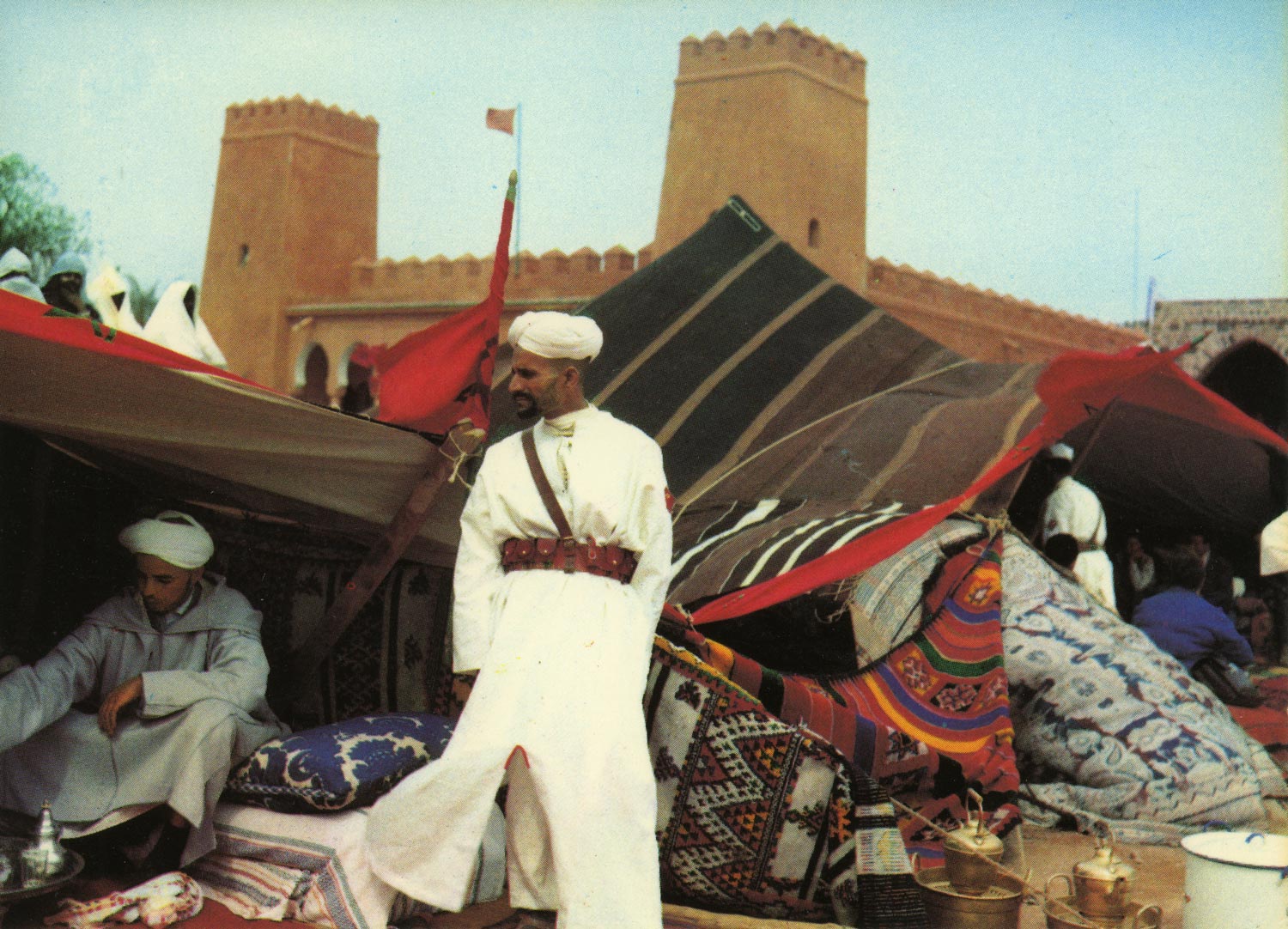  Sochepress - View of the ksar with performers in front of tent 