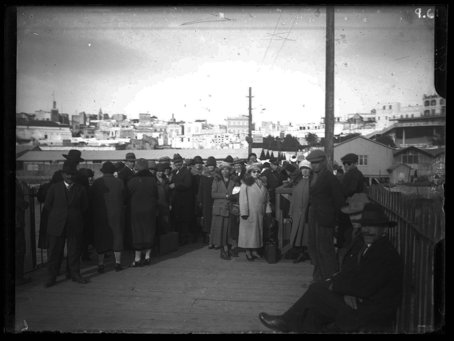 Portrait of Europeans at Tangier wharf
