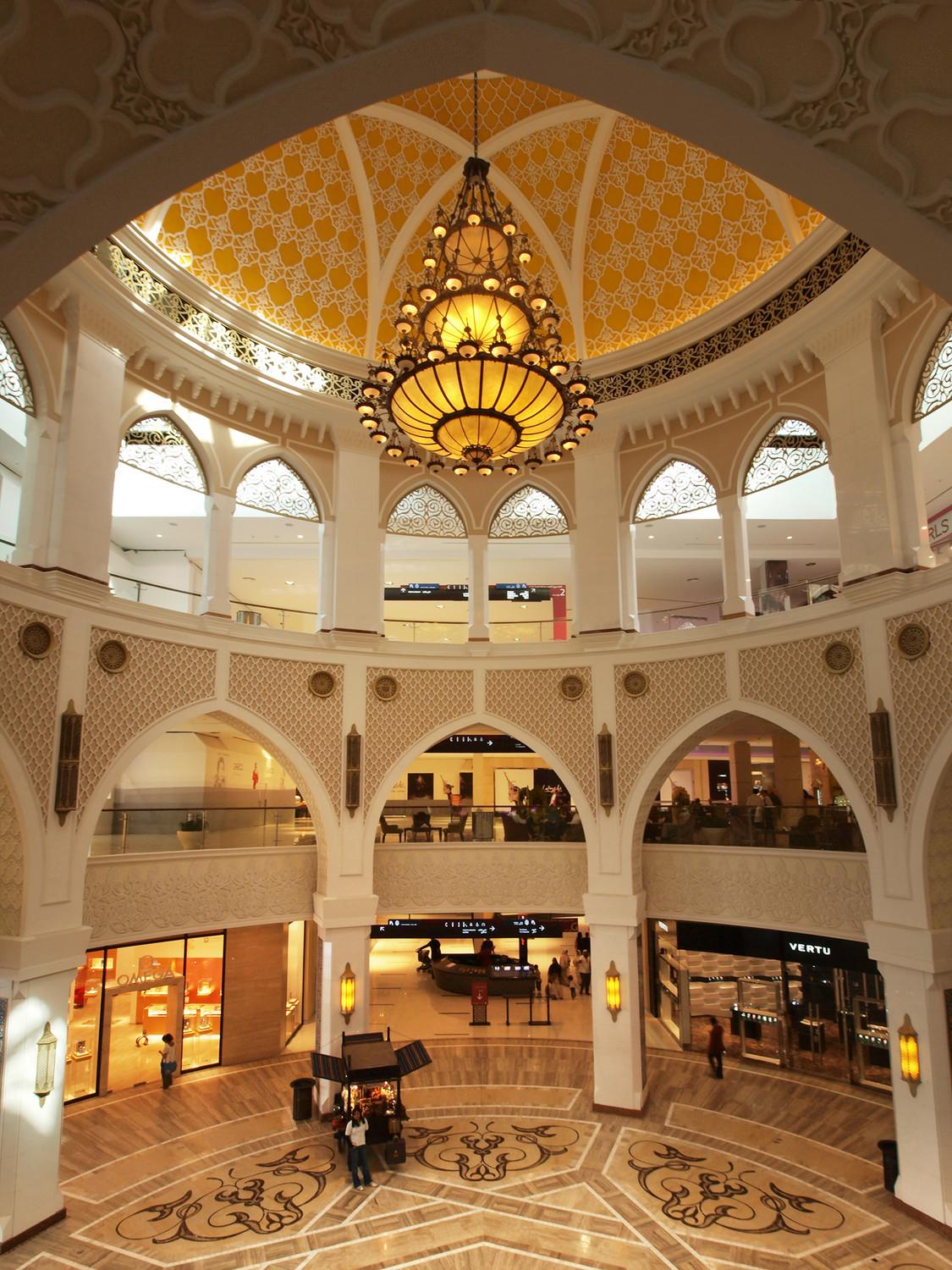 The mall features the largest covered souk in the world with intricate surfacing and massive atrium spaces.