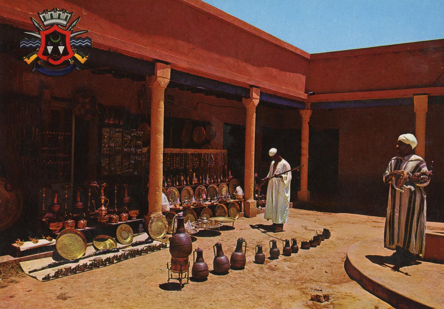 Postcard depicting the jewelery market with the city seal in the upper left<br>