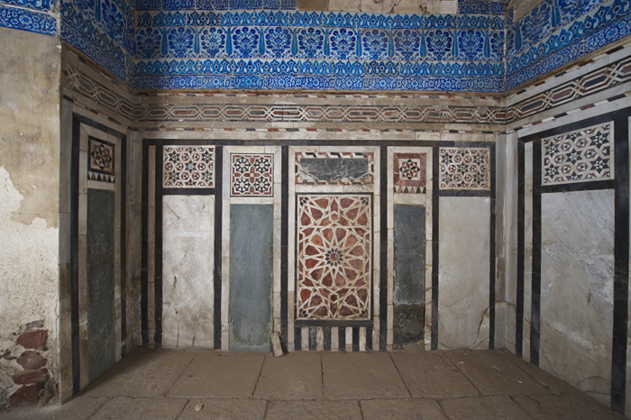 Jami' Aq Sunqar Restoration - Interior polychrome marble panels and Iznik tiles in the mausoleum of Ibrahim Agha Mustafazan, before restoration














