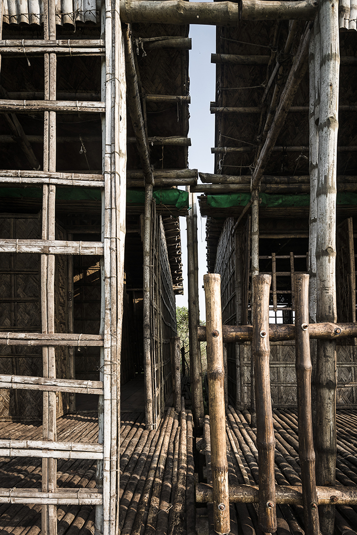 <p>Each module is tied to four large poles (one at every angle) made from “Borak” bamboo. They are buried two meters deep into the ground and keep the structure from drifting during the monsoon season.&nbsp;</p>