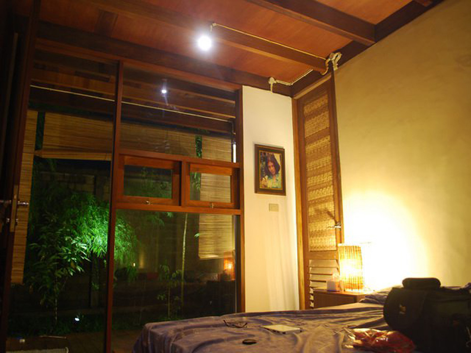 The master bedroom shares the cooling effect of the mini forest outside of the room, thus no air conditioning is required