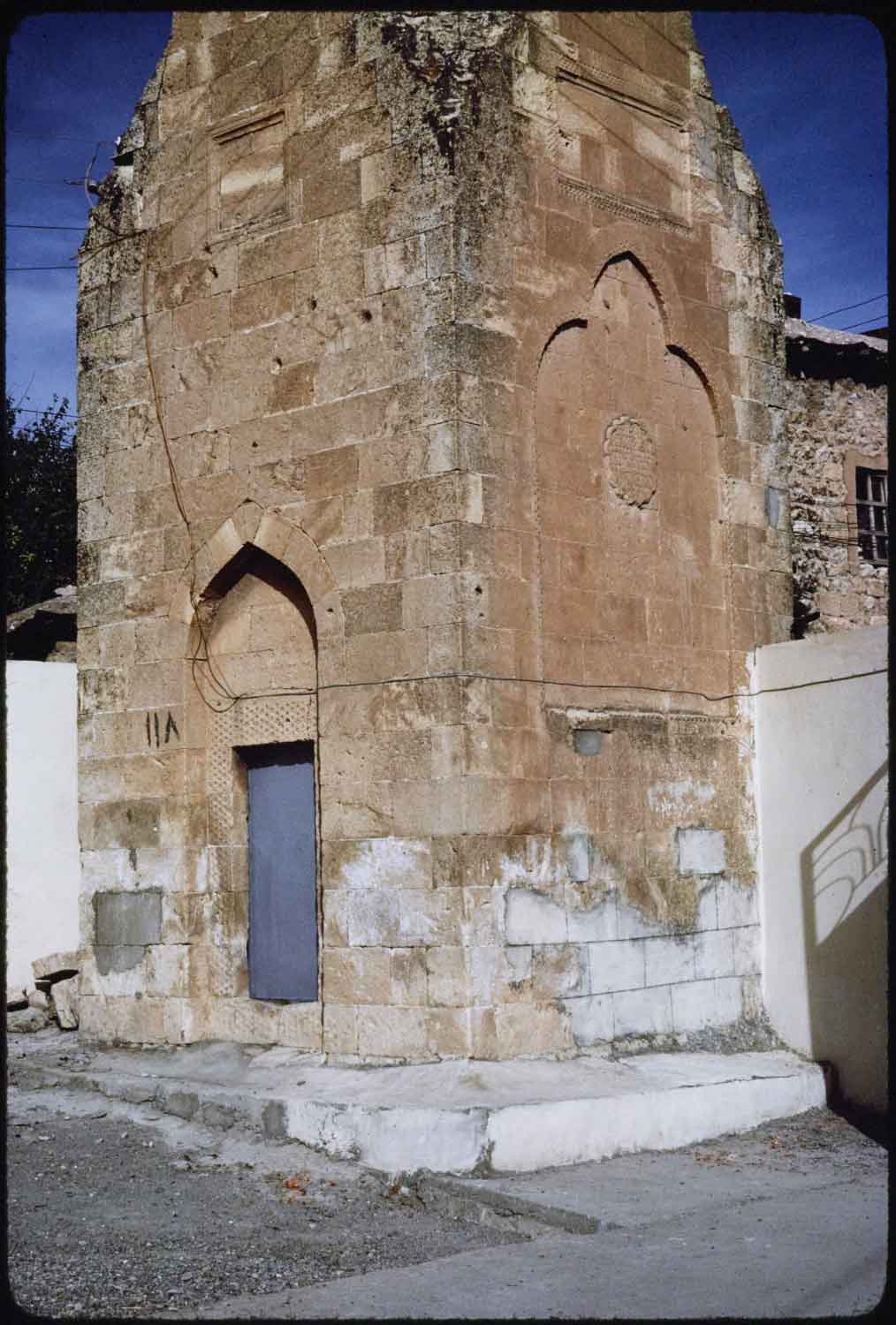 Minaret base with access door. 