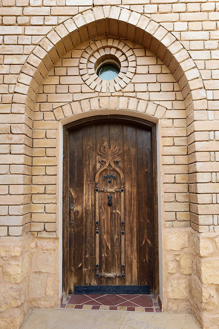 A handcrafted wooden entrance door 