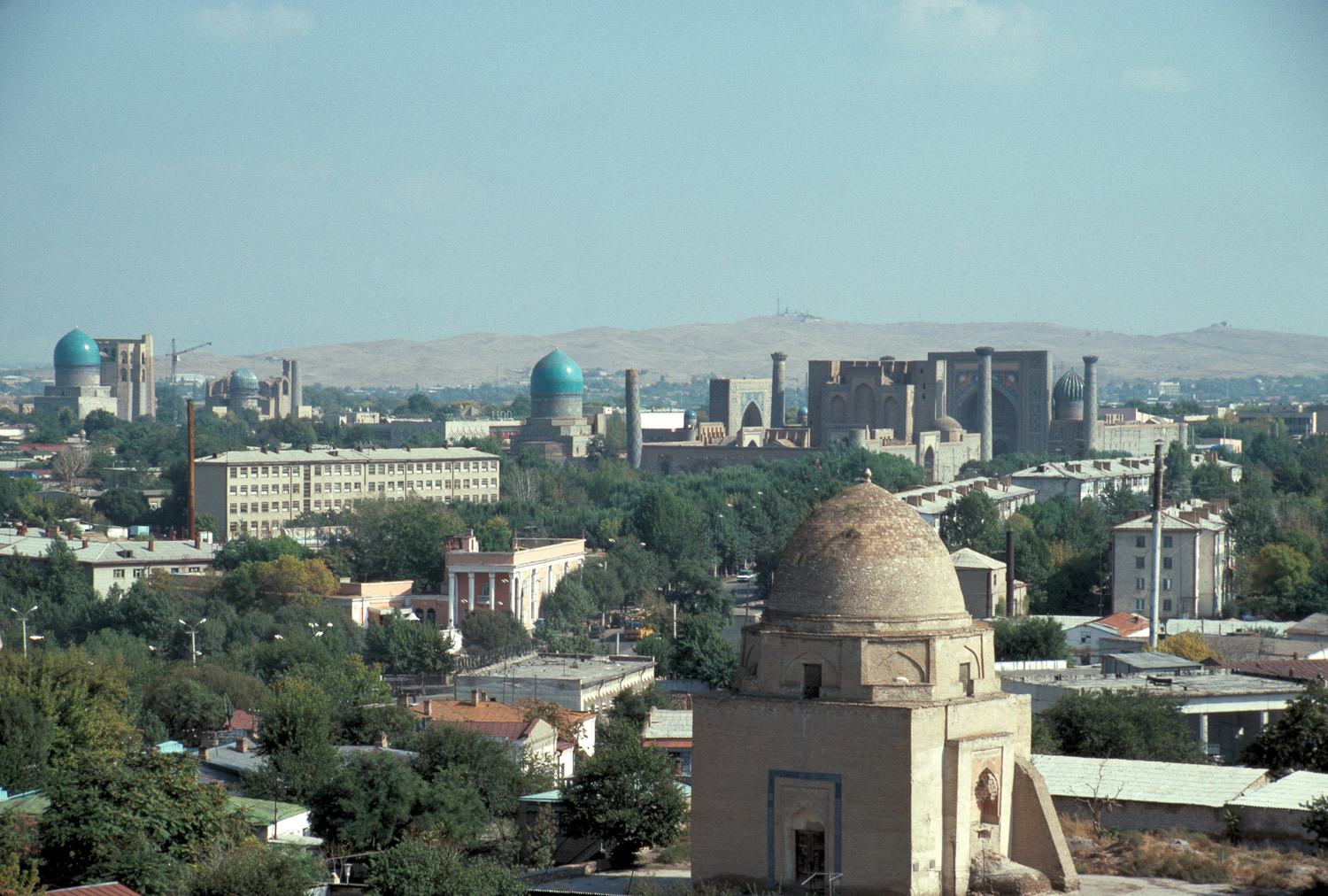 Exterior panoramic view of city with Mausoleum of Ruhabad in forefront