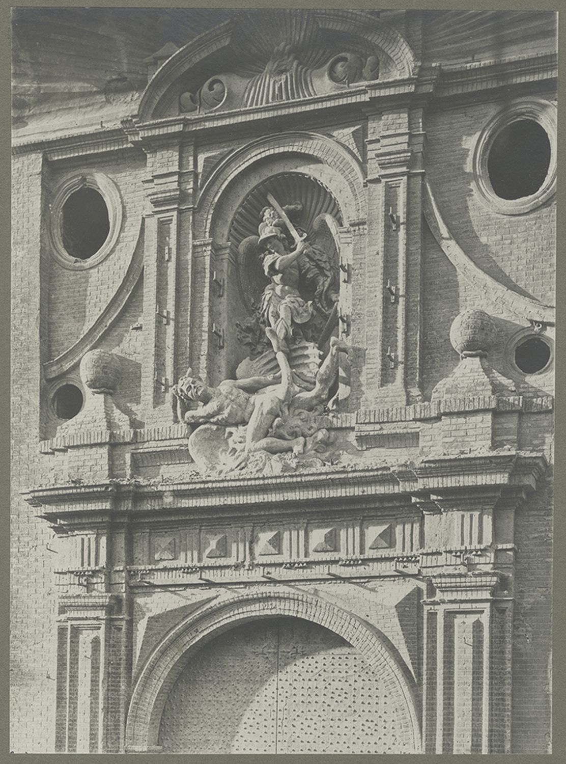 View of sculptural facade over portal.&nbsp;