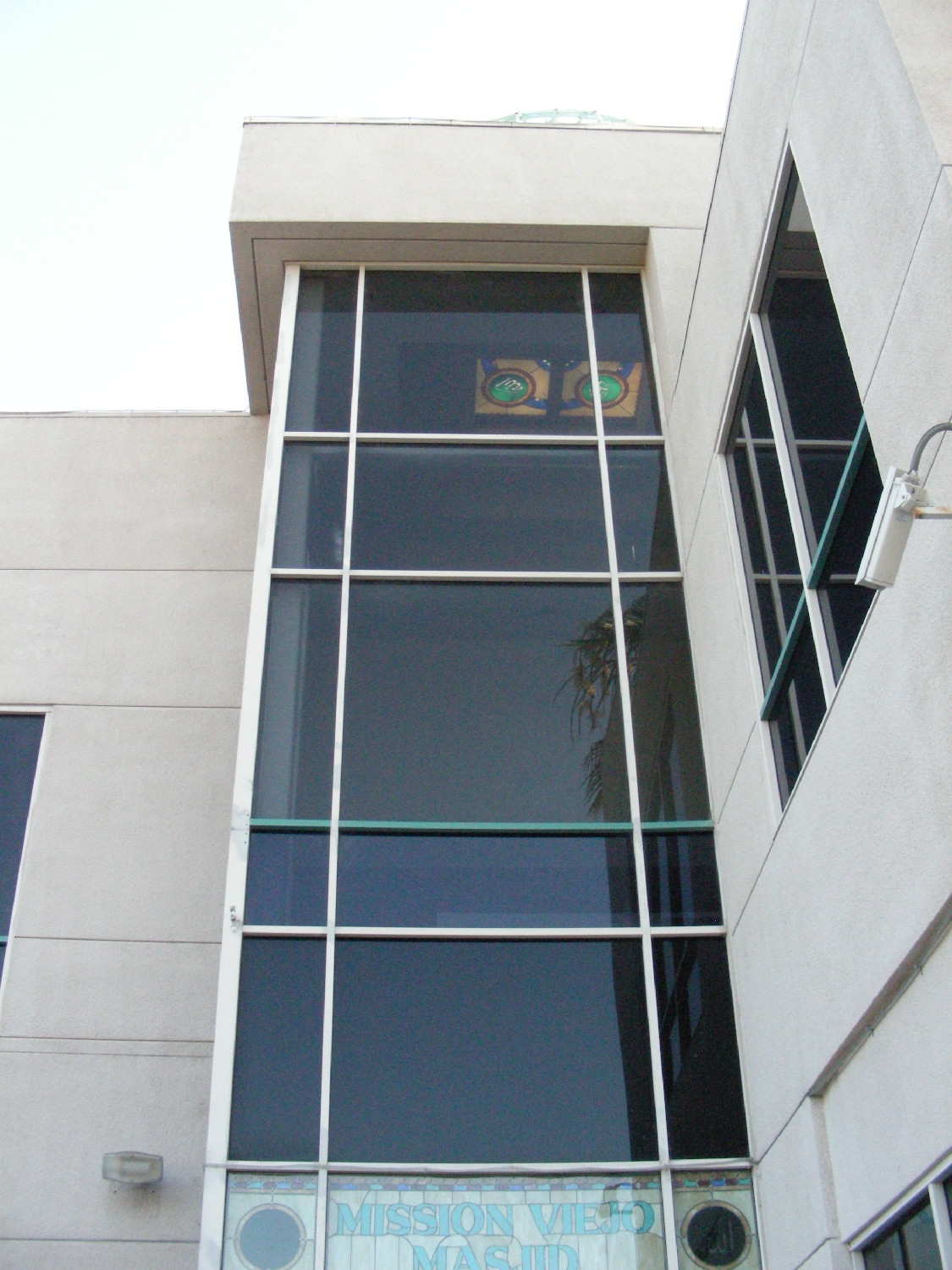 Exterior, windows above entrance