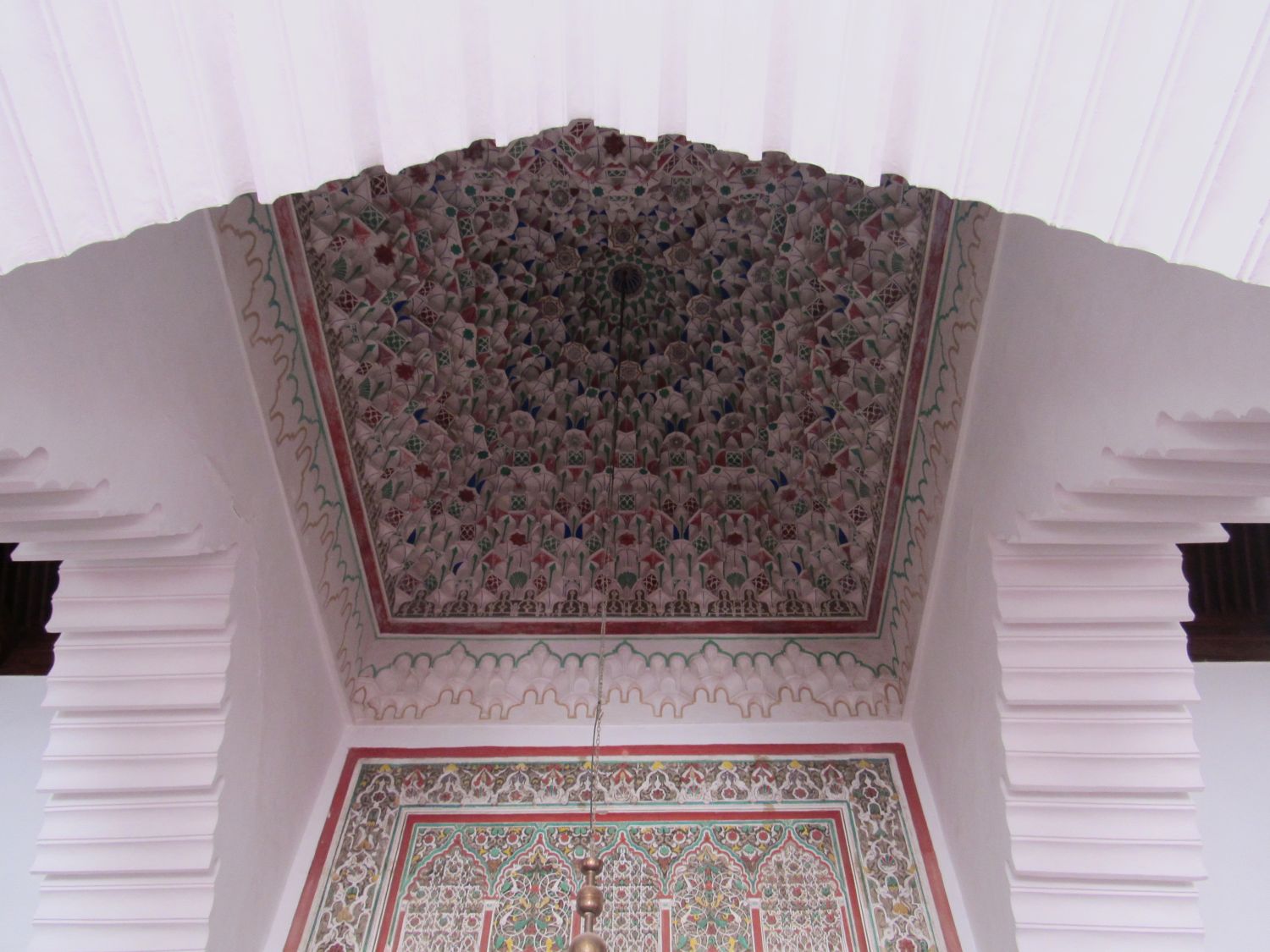 Interior view of the painted muqarnas dome of the mihrab