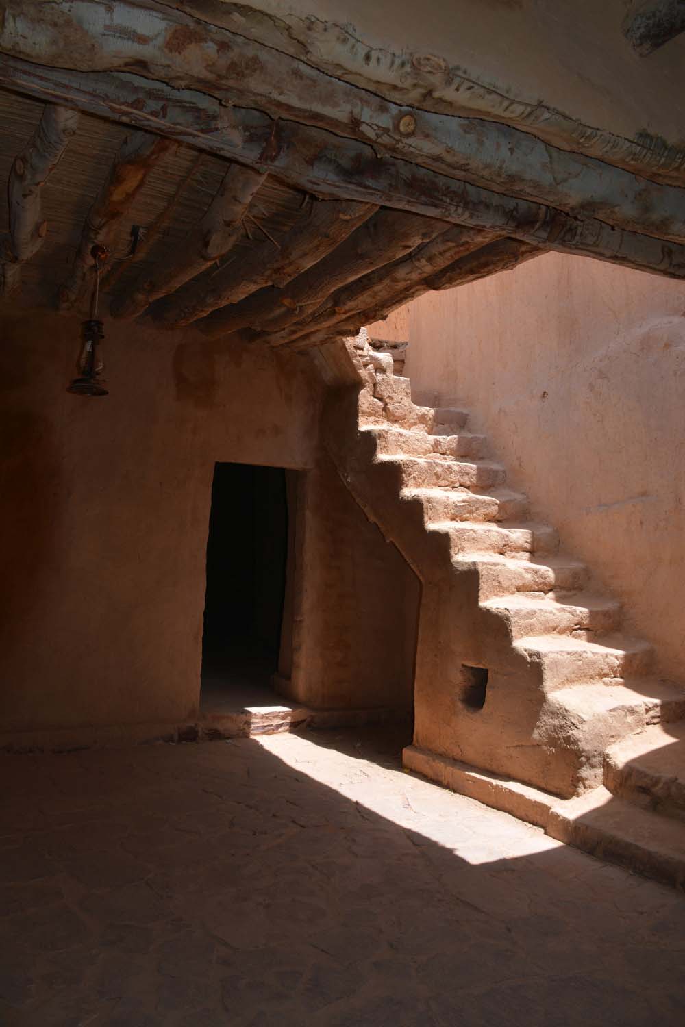 al-Ula - Interior view toward stairs and wood bean ceiling