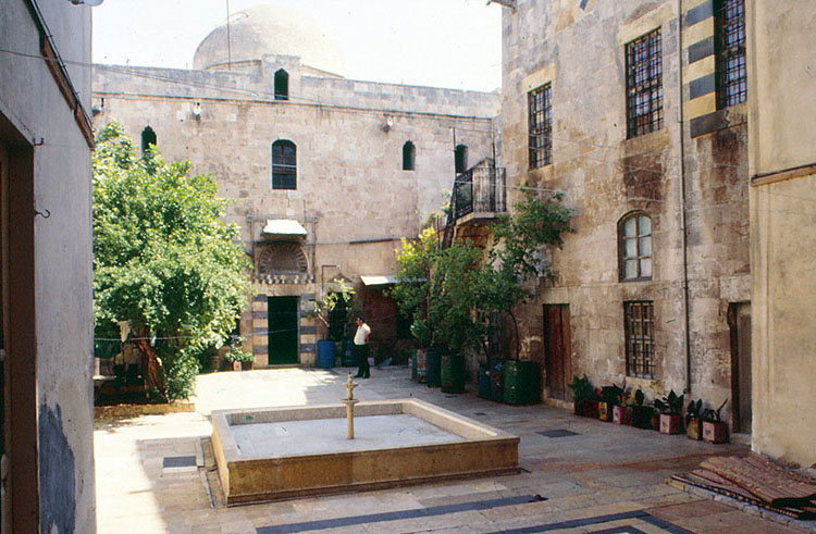 <p>Courtyard: view facing north, showing central pool and facade of reception hall (qa'a)</p>