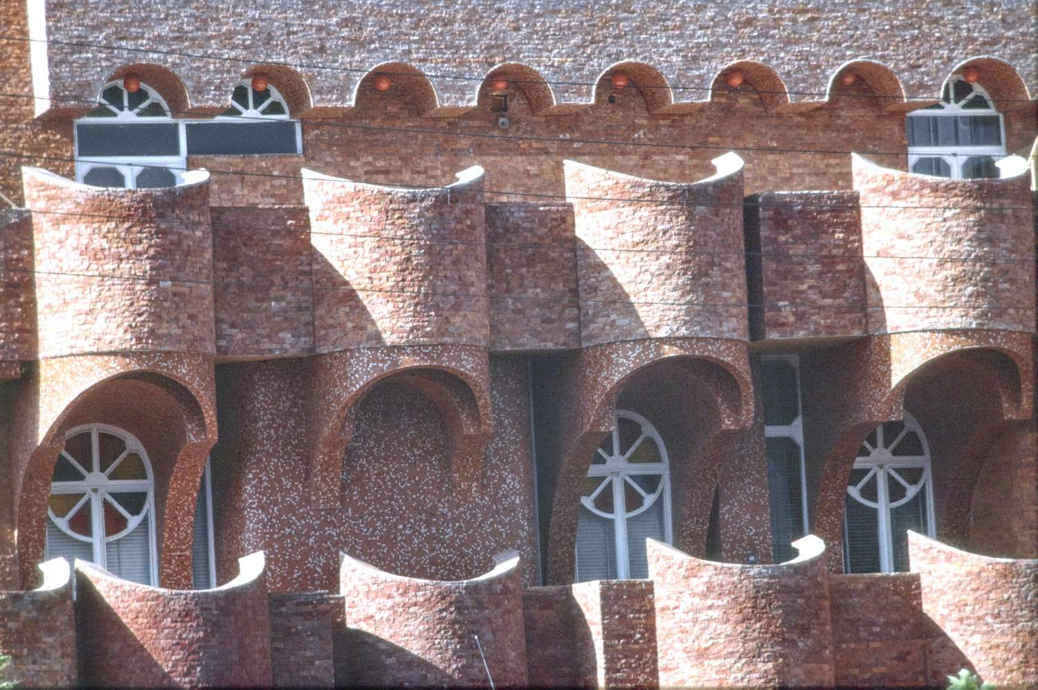 House 1 (IUHP Site) - Detail view of facade showing balconies. 