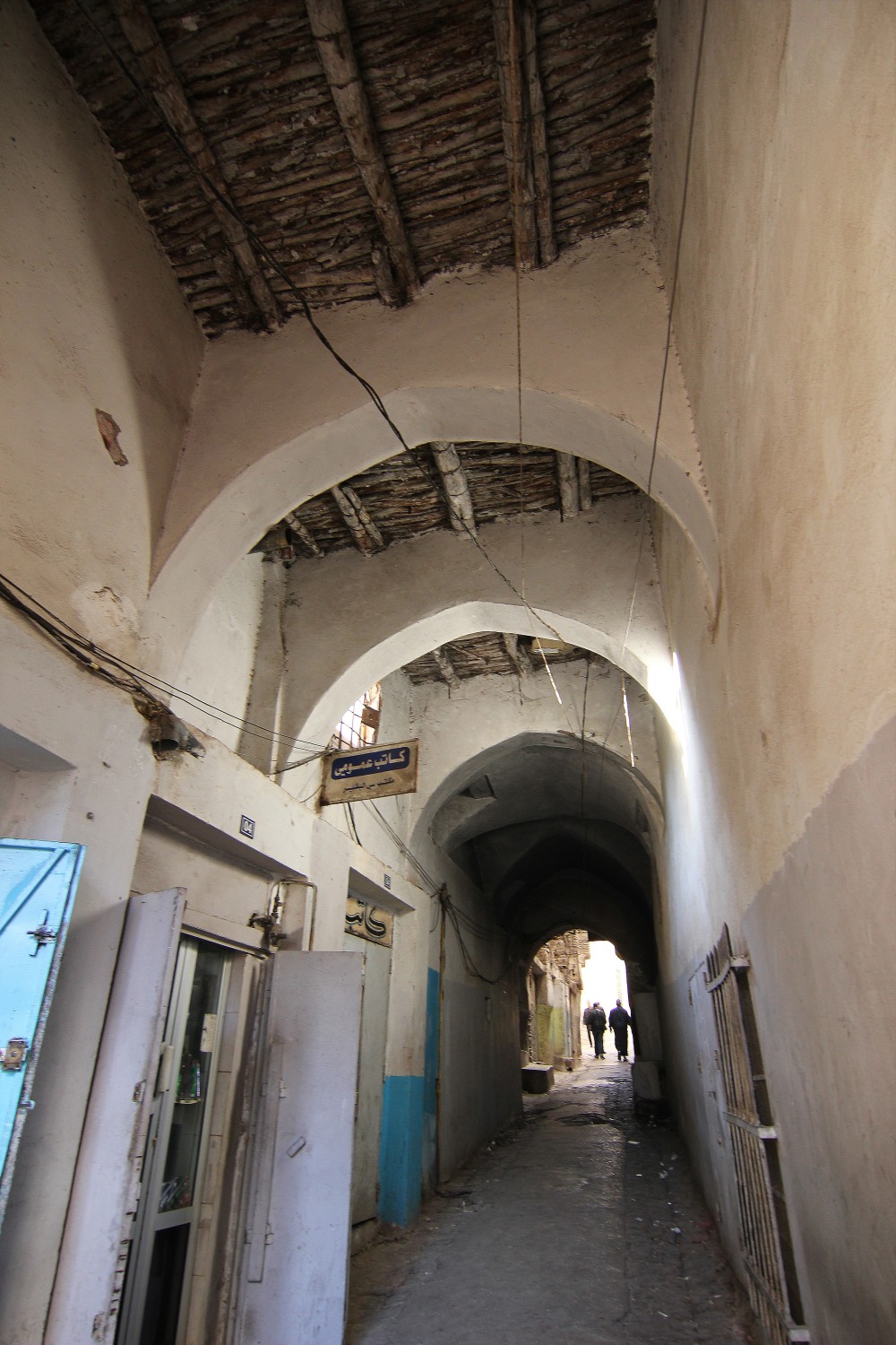 Rue Sellahi Tahar, view of narrow covered street showing pointed arches and wooden ceiling with log structure