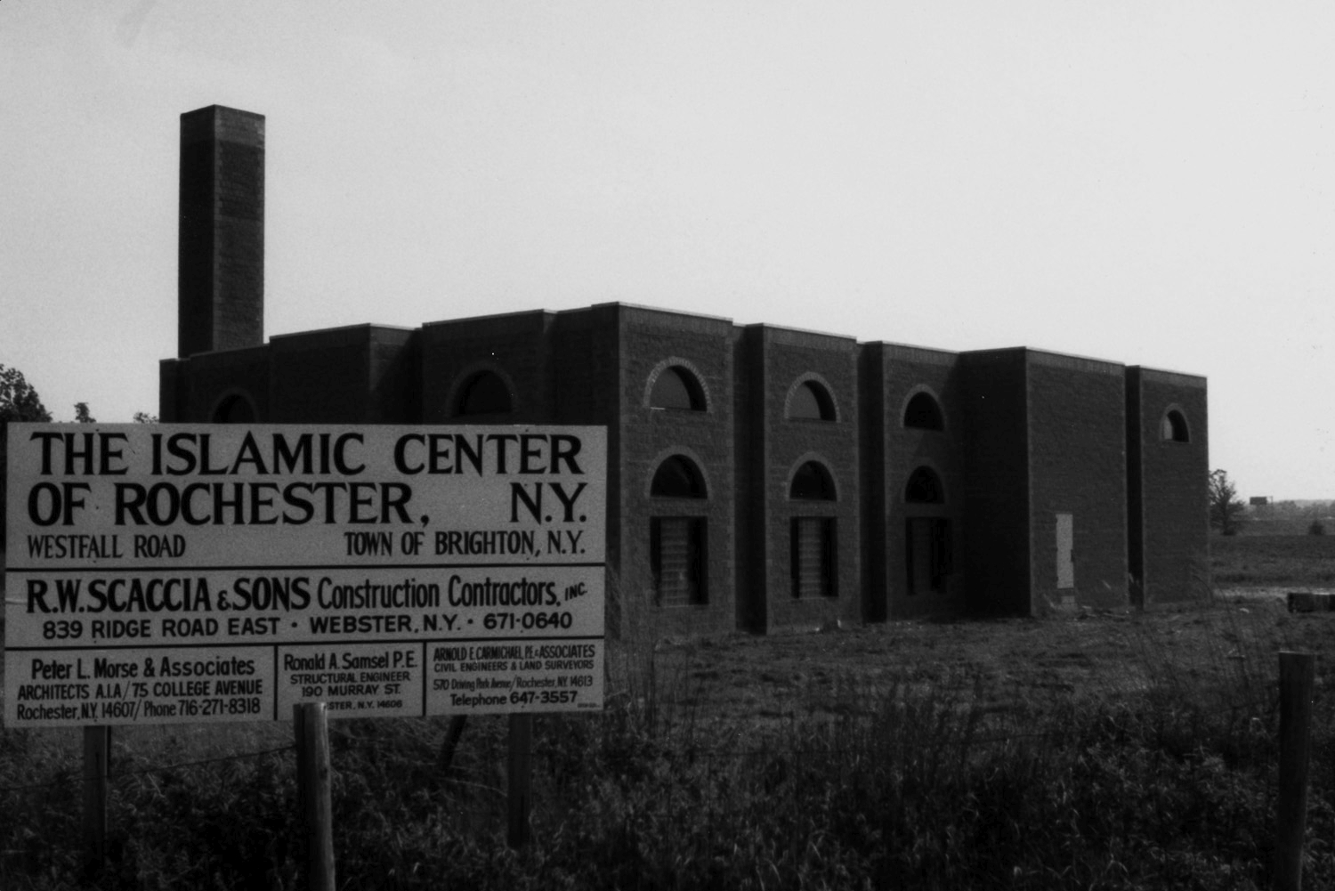Islamic Center under construction, with construction project sign
