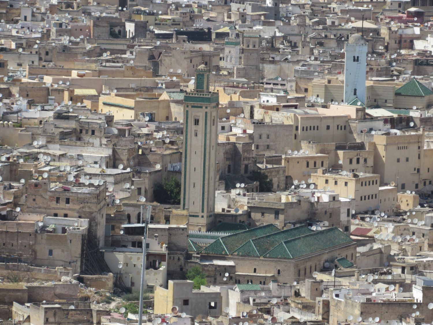 Exterior view, minaret and Fez skyline toward the white minaret of the Qarawiyyin Mosque.