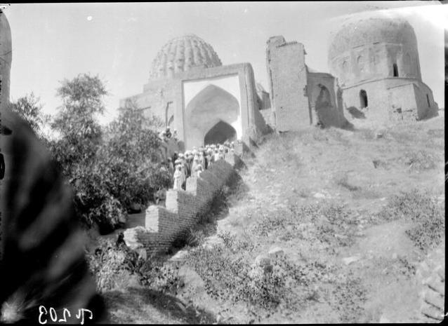 Exterior view from the southeast looking uphill toward the middle chahar taq. The stairs lead up from Dargah Abd al-Aziz. The ribbed dome in the midground to the left belongs to the Amir Zadeh mausoleum. The domed structure to the right is the Shirin Beg Agha mausoleum, before which stand the ruins of the Amir Husayn ibn Tughluq Tekin mausoleum