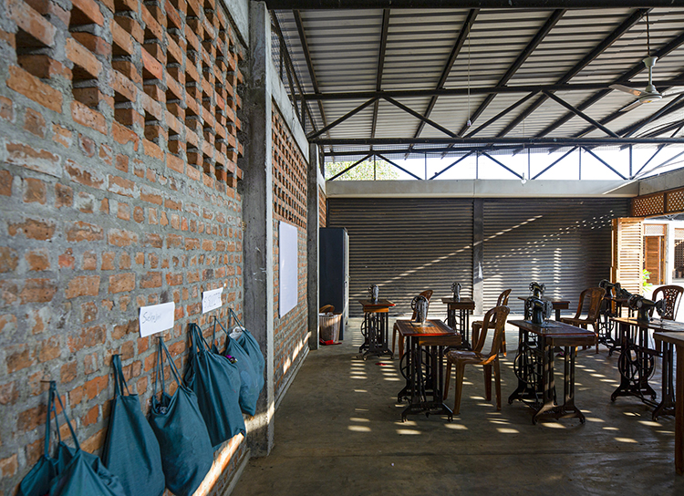 <p>The perforated brick walls maximise airflow and the raised aluminium roofs partially reflect the solar heat owing to a Low-E coating, keeping the interiors cool.</p>