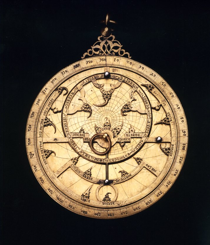 Planispheric Astrolabe (Al-Andalus, probably Toledo); engraved copper alloy inlaid with silver (Nasrid, 14th century)