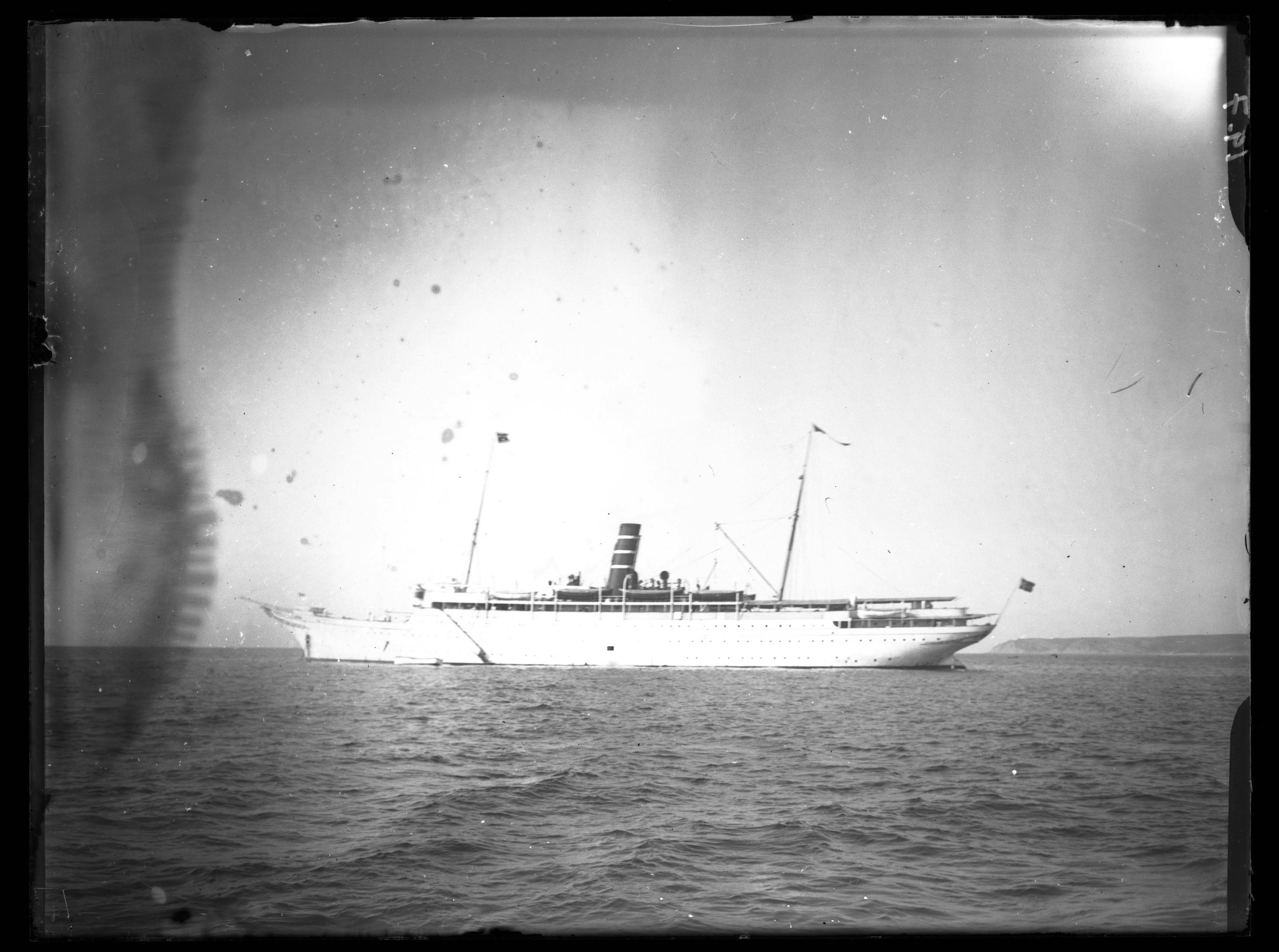 <p>Side view of a white cruise chip with a striped smoke stack on the Mediterranean.</p>