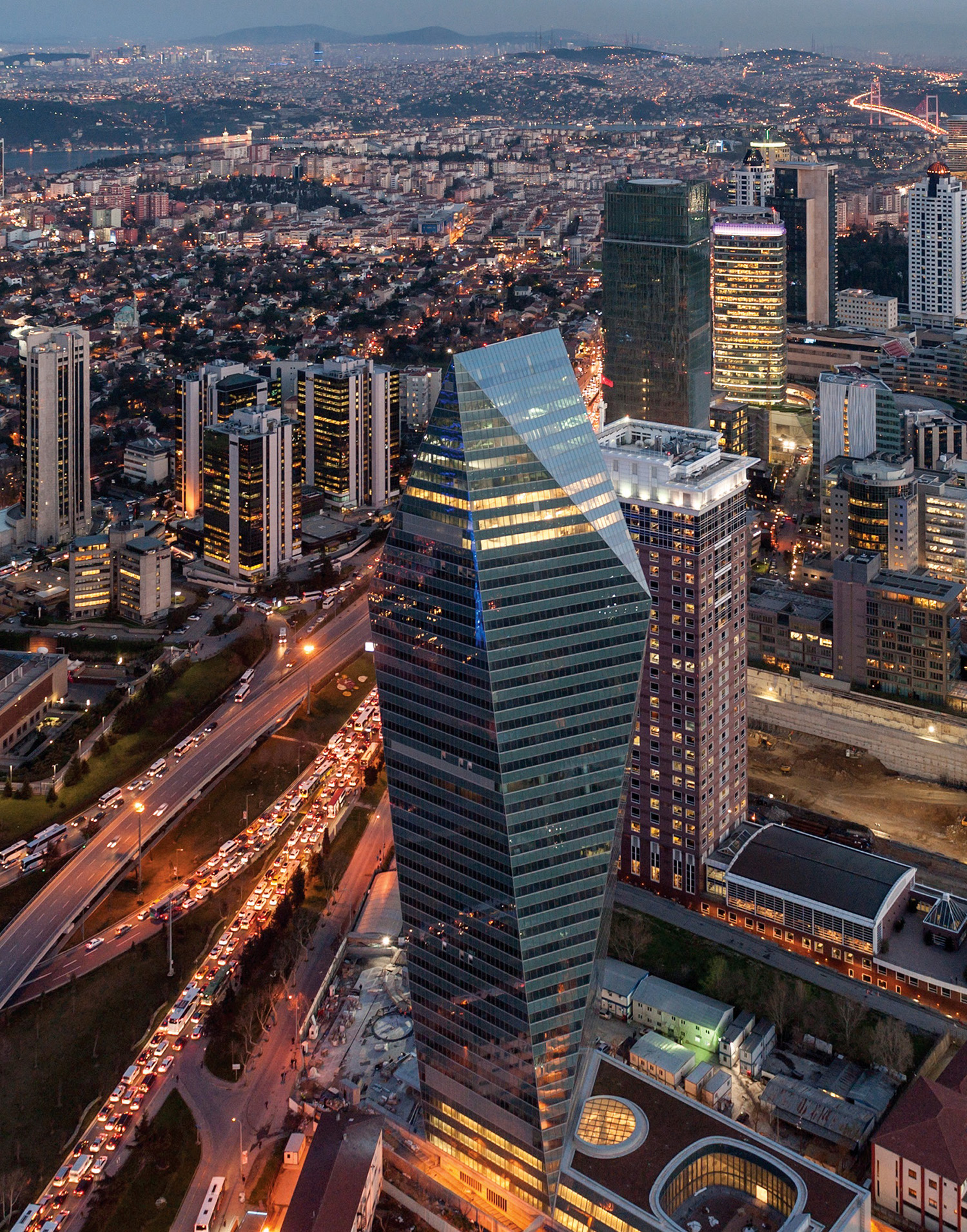 Aerial view of the building overlooking the city of Istanbul at night 