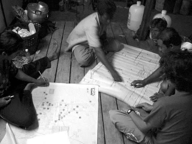 Picture shows how people help to do the mapping to identify who had housing problems