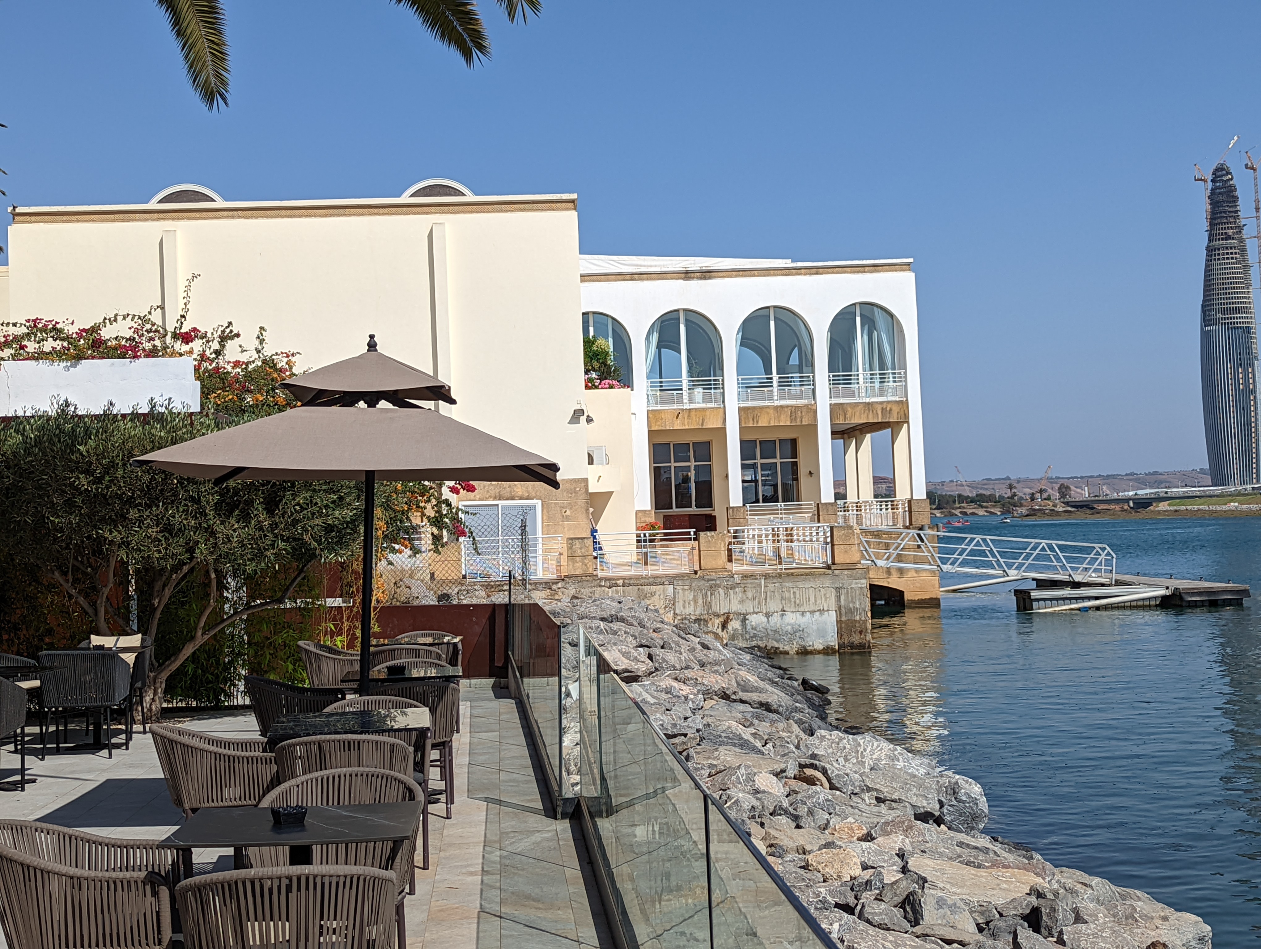 <p>View along the terrace of the Dawliz Art and Spa toward the Royal Nautical Club, with the tower in the  background to the right.</p>