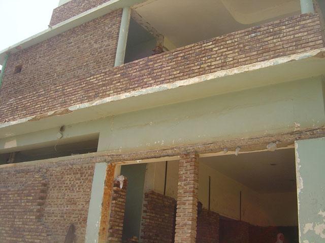External cladding with local red bricks